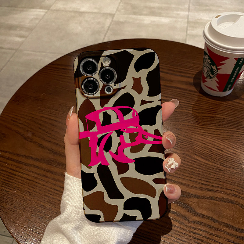 Pink Graffiti on a Brown and White Patternphone case for iPhone/16/15/14/13/12/116/Plus/Pro/Max Hot sale wholesale customizable pattern cases