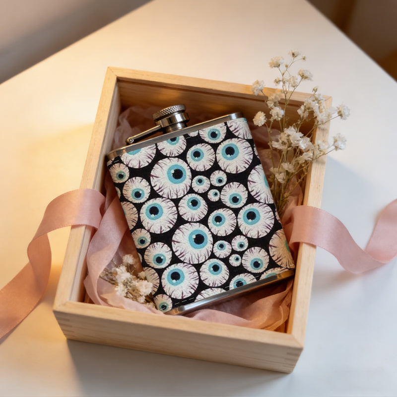 A pattern of cartoon eyeballs 1pc of a Portable Flask, a Small Stainless Steel Liquor Flask, 8-Ounce Capacity, Suitable for Outdoor And Home Use