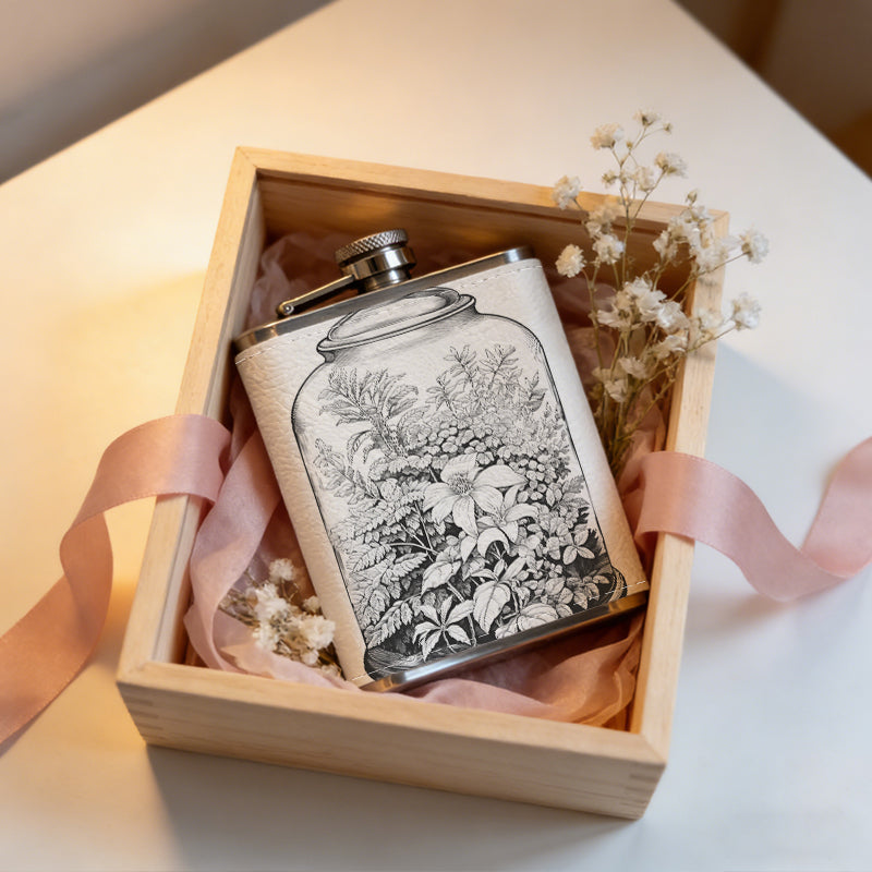 Dried flowers in a glass jar 1pc of a Portable Flask, a Small Stainless Steel Liquor Flask, 8-Ounce Capacity, Suitable for Outdoor And Home Use